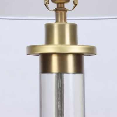 A pair of Modern lucite and brass Column Table Lamps circa 1950 