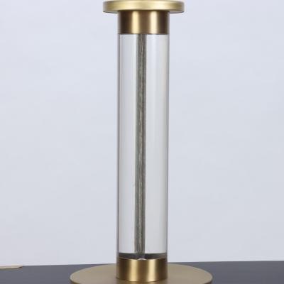 A pair of Modern lucite and brass Column Table Lamps circa 1950 