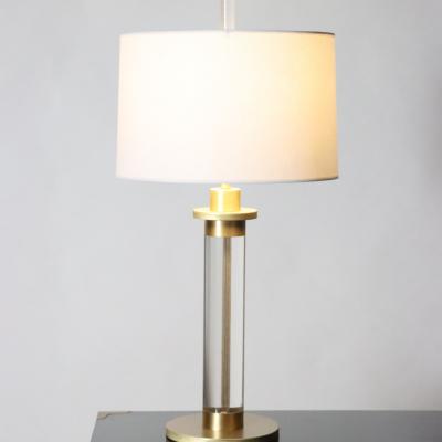 A pair of Modern lucite and brass Column Table Lamps circa 1950 