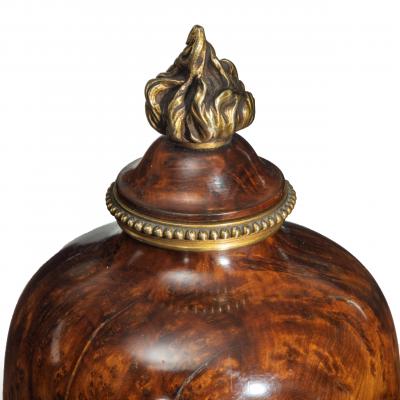 A pair of Napoleon III Moroccan burr thoya wood urns