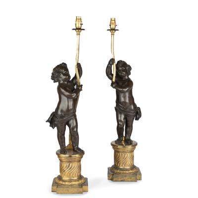 A pair of Napoleon III bronze and ormolu table lamps