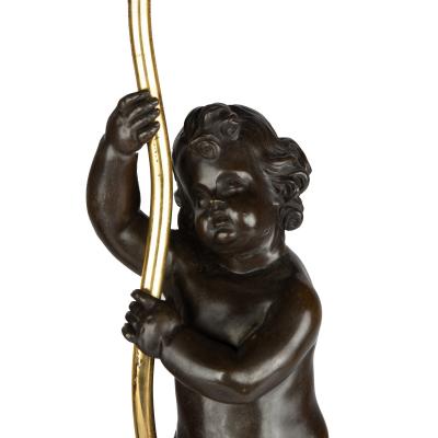 A pair of Napoleon III bronze and ormolu table lamps