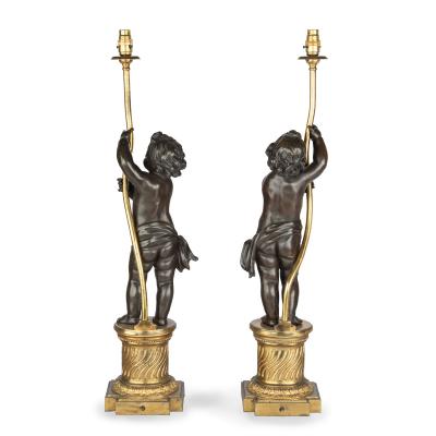 A pair of Napoleon III bronze and ormolu table lamps