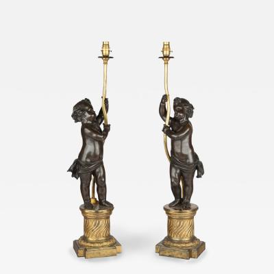 A pair of Napoleon III bronze and ormolu table lamps