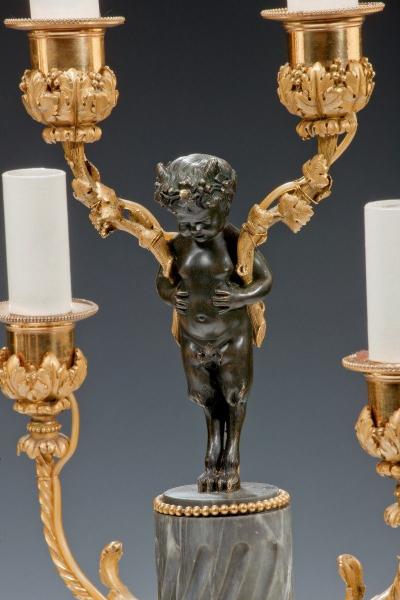 A pair of Napoleon III six light candelabra