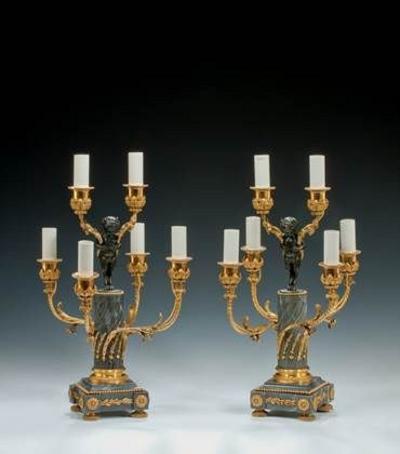 A pair of Napoleon III six light candelabra
