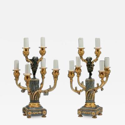 A pair of Napoleon III six light candelabra