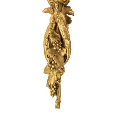 A pair of Napoleon III two branch ormolu wall lights