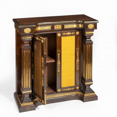 A pair of Regency brass inlaid rosewood side cabinets