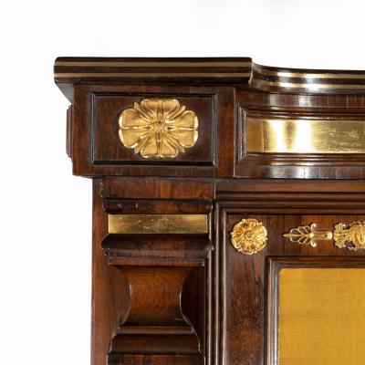 A pair of Regency brass inlaid rosewood side cabinets
