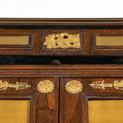 A pair of Regency brass inlaid rosewood side cabinets