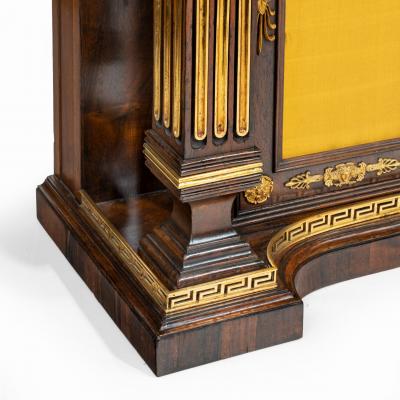 A pair of Regency brass inlaid rosewood side cabinets