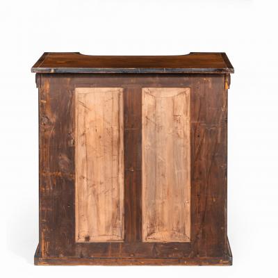 A pair of Regency brass inlaid rosewood side cabinets