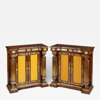 A pair of Regency brass inlaid rosewood side cabinets