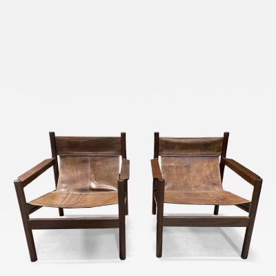 A pair of Roxinho Armchairs designed by Michel Arnoult
