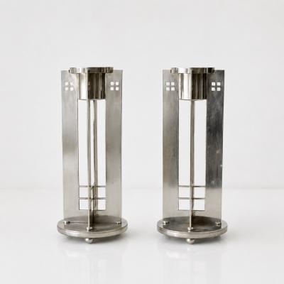 A pair of Silver Plate Swid Powell Candlesticks
