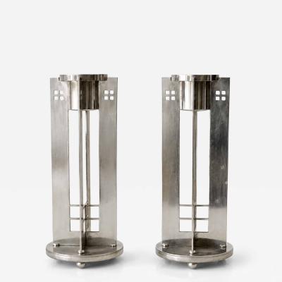 A pair of Silver Plate Swid Powell Candlesticks