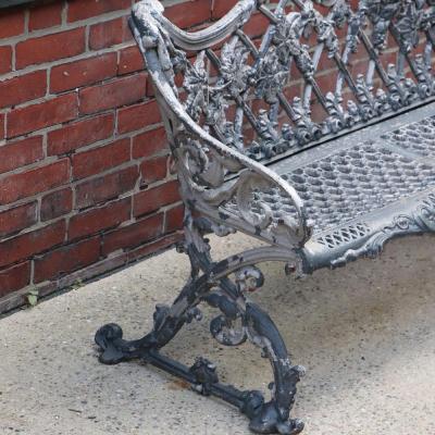 A pair of aluminum sleigh form garden benches circa 1950