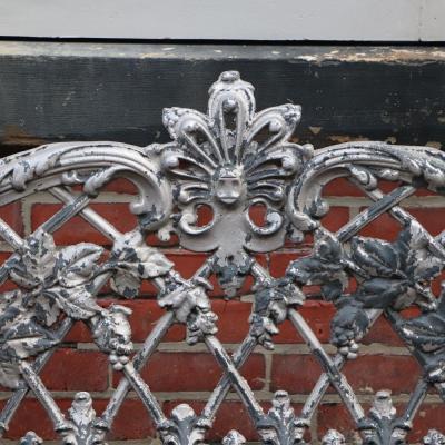 A pair of aluminum sleigh form garden benches circa 1950