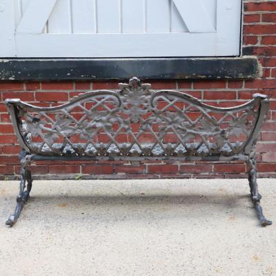 A pair of aluminum sleigh form garden benches circa 1950