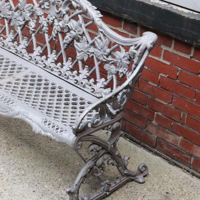A pair of aluminum sleigh form garden benches circa 1950