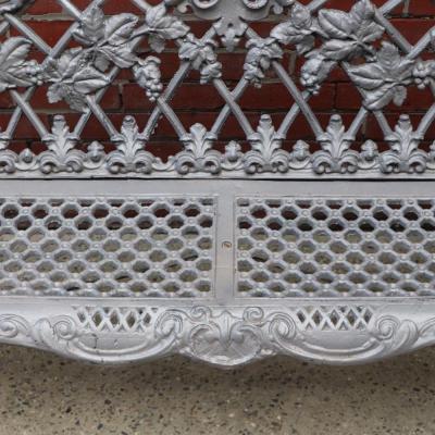 A pair of aluminum sleigh form garden benches circa 1950