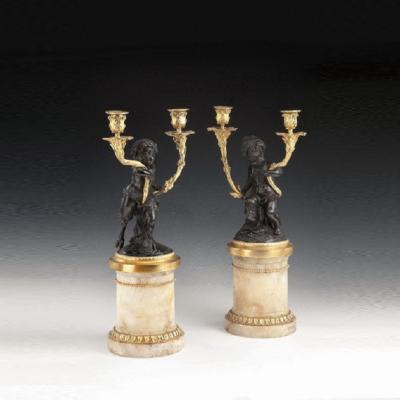 A pair of antique French bronze and gilt Candelabra
