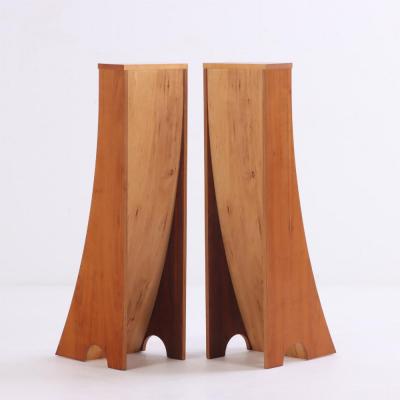A pair of bench made sculptural walnut bookcases Contemporary