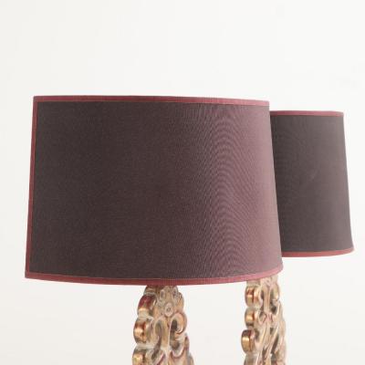 A pair of carved table lamps in the manner of James Mont C 1950 