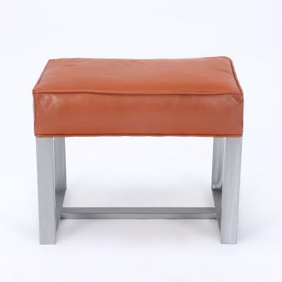 A pair of chrome and leather covered benches or small stools Contemporary