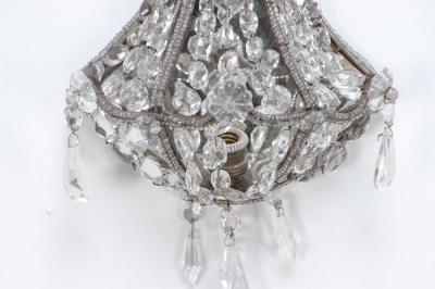A pair of crystal wall sconces in the manner of Jansen circa 1940