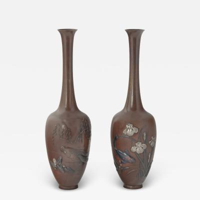 A pair of fine Meiji period bronze vases by Hidenobu