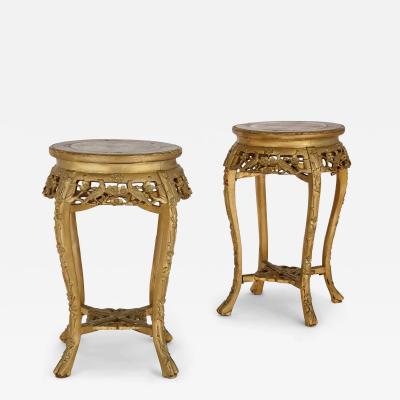 A pair of giltwood and marble inlay stands