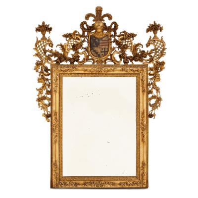 A pair of giltwood and polychrome decorated antique Italian mirrors