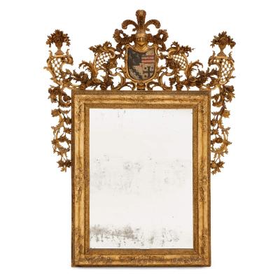 A pair of giltwood and polychrome decorated antique Italian mirrors