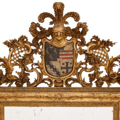 A pair of giltwood and polychrome decorated antique Italian mirrors