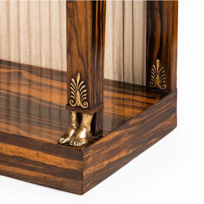 A pair of high Regency coromandel and ormolu bookcase console tables