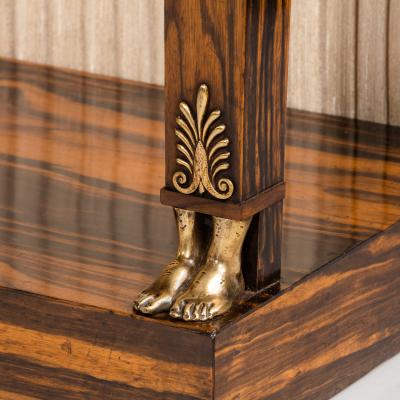 A pair of high Regency coromandel and ormolu bookcase console tables