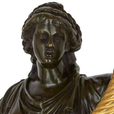 A pair of large French ormolu and patinated bronze candelabra