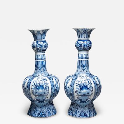 A pair of monumental blue and white Delftware vases 