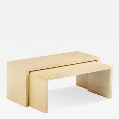A pair of nesting parchment coffee tables in the manner of Jean Michel Frank 