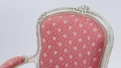 A pair of painted and carved French Louis XV style open arm chairs circa 1900 