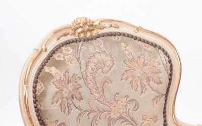 A pair of painted and giltwood French upholstered open armchairs Louis XV style