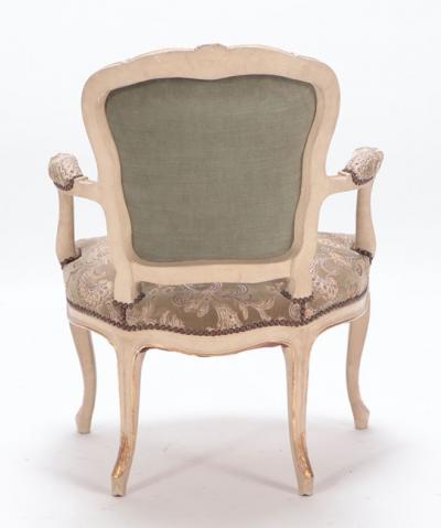A pair of painted and giltwood French upholstered open armchairs Louis XV style