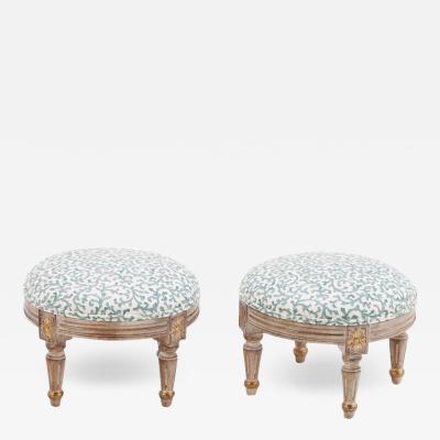 A pair of petite French Louis XVI style upholstered foot stools Contemporary 