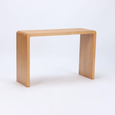 A pair of rounded cerused oak console tables Contemporary