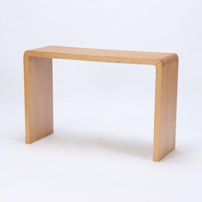A pair of rounded cerused oak console tables Contemporary