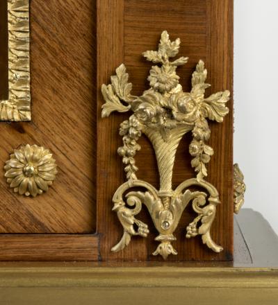 A pair of small Napoleon III kingwood display cabinets on stands