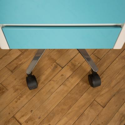 A pair of white and blue two drawers side cabinets on rolling base 1970s