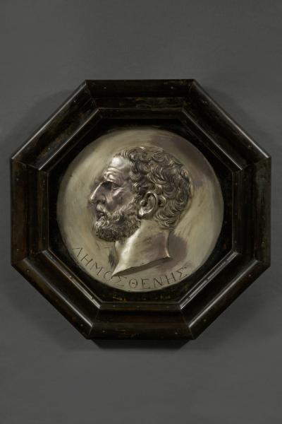 A pair silvered copper repouss circular bas relief portrait roundels